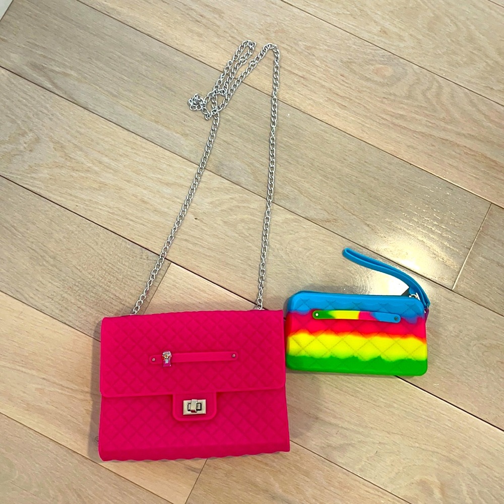 Jelly purse and wristlet.  Hot pink with silver chain and gumball charm.  Cute!!